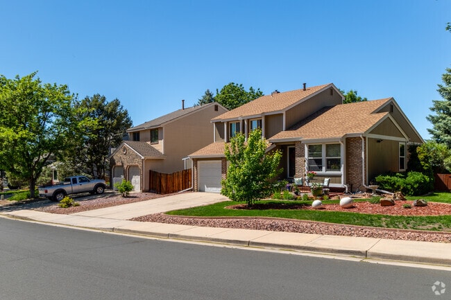 Split-level homes sit on tree-lined streets in Woodgate.