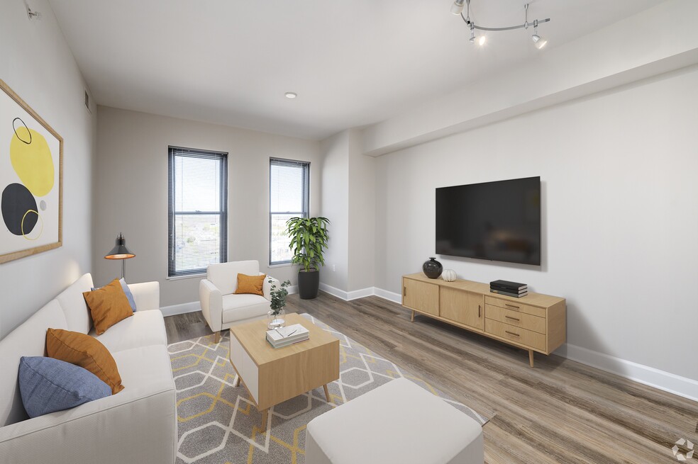 Living room with LVT flooring (virtually staged)