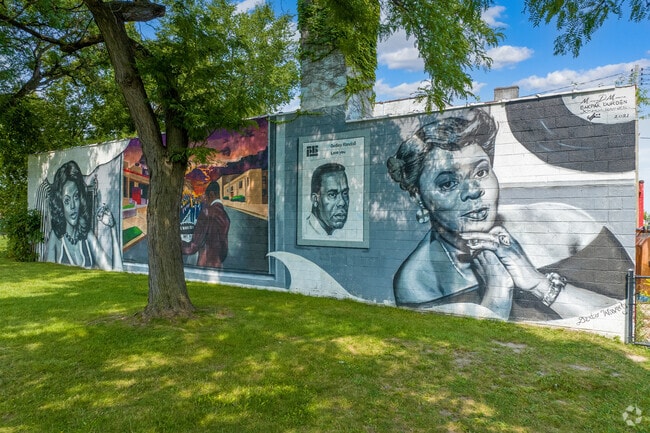 Zussman Park murals by BAKPAK Durden, Mario Moore and Joshua Rainer is displayed near Oakman Boulevard Community.