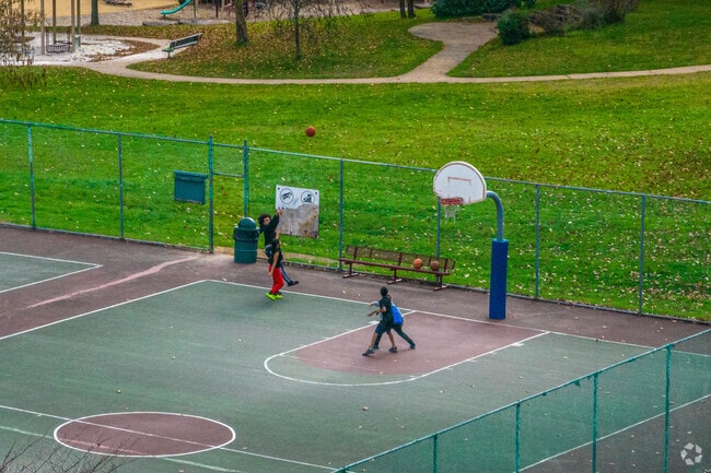 Children come to play a quick game of basketball at McDade Park in Taylor.