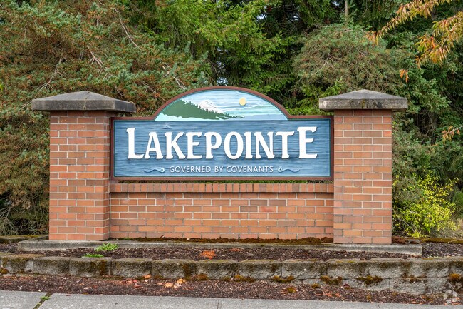 Lakepointe: a serene community where lakeside living meets charming homes and nature.