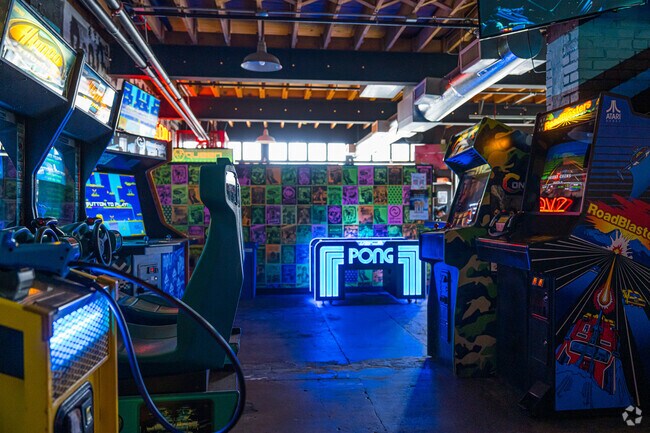 Neon lights light up the arcade games at Up-Down.