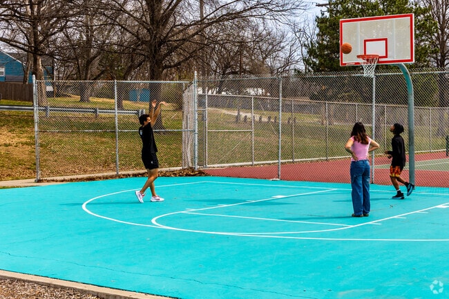 Friends meet for a game of basketball at the Kansas City North Community Center.