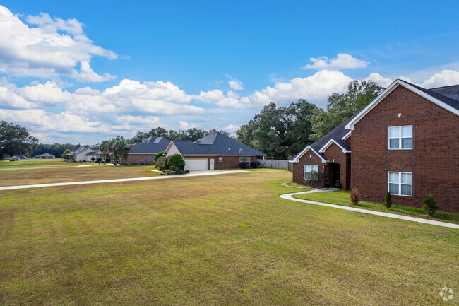 The Oaks Homes is a newly constructed neighborhood with homes on large lots of land.