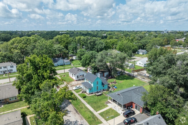 A Douglass Park home adds another pop of color to the green landscape.
