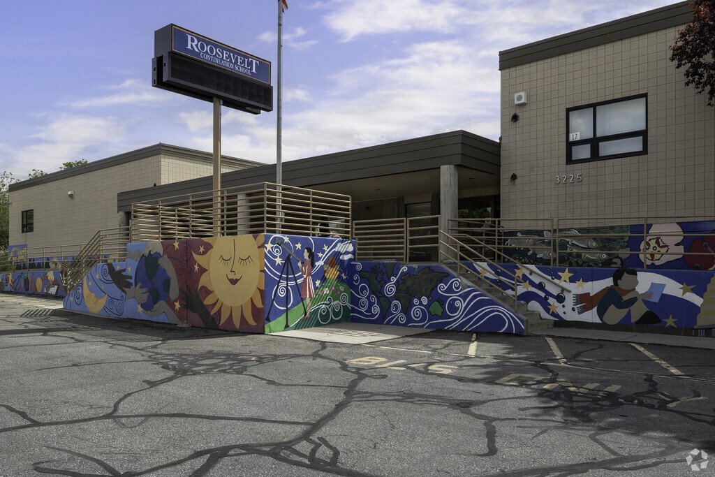 Roosevelt Continuation School has a bright and cheery mural to welcome students in Millcreek.