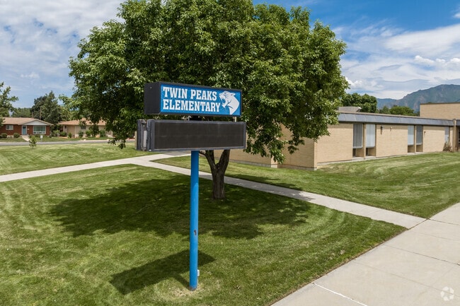 A blue electronic sign at Twin Peaks Elementary School.