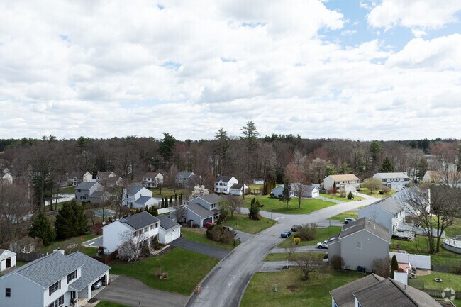 Tree-lined streets and neat driveways define the residential charm of Malta.