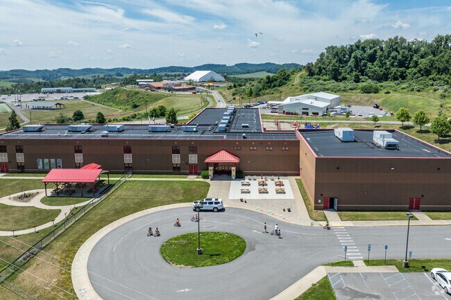 The bus loop at Mylan Park Elementary School makes for a fun bicycle track.