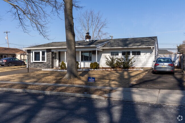 This ranch home in the Red Cedar Hill neighborhood has recently been renovated with a new facade.