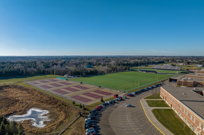 There are multiple sprots fields and courts at Stillwater High School.