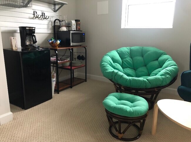Kitchenette area and sitting area.