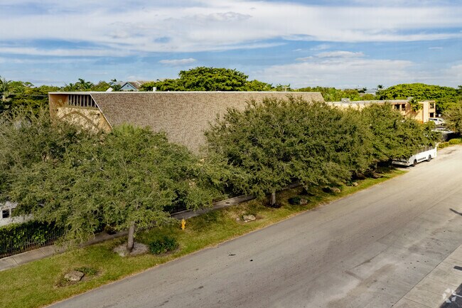 Oak trees adorn the Upper Room Christian Faith Center and Academy in Lauderhill, FL.