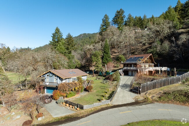 Chalet-style homes layer the hills around the Willow Creek neighborhood.