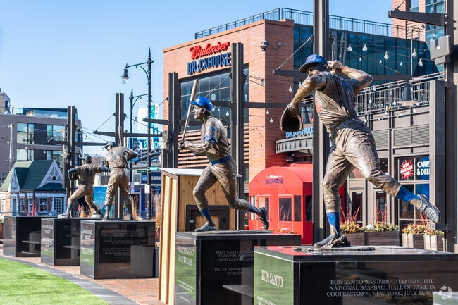 You can find intricate sculptures of many Cubs legends at Gallagher Way in Wrigleyville.