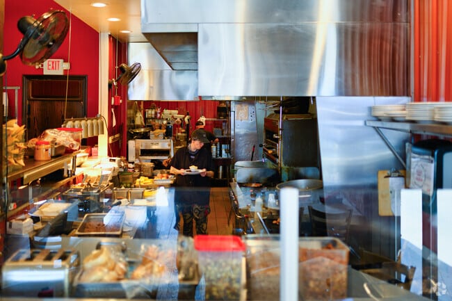 Workers busily prepare lunch at Tavern 109 in Williamston.