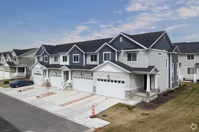 Charming townhomes in Lakefront at Vineyard Town Center in Outer Orem.