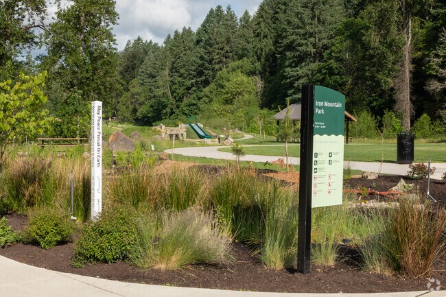 A totem wish Peace on Earth in many languages at Iron Mountain Park playground next to the Lakeview-Summit Neighborhood.
