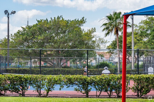 The tennis courts at Huntington Park are popular during the early hours of the day.