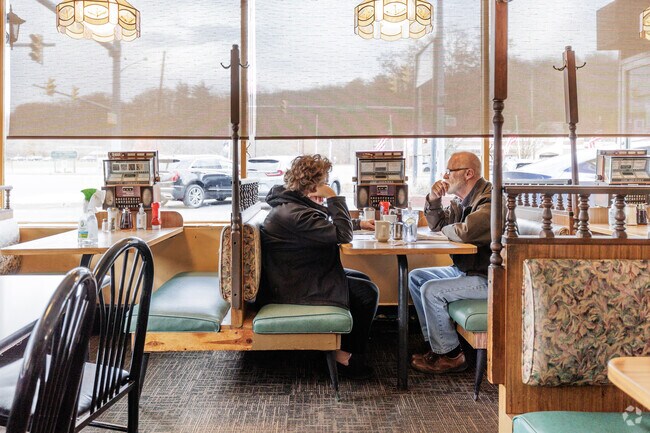 A couple enjoying lunch at Gourmet Family Restaurant in Chinchilla, PA.