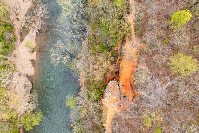 Silver Creek residents enjoy the beauty of the Ozarks along Shoal Creek.