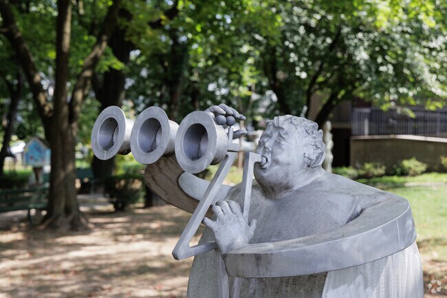 A horn blower sculpture in the Erika and David Boyd Sculpture Garden in Leonia, New Jersey.