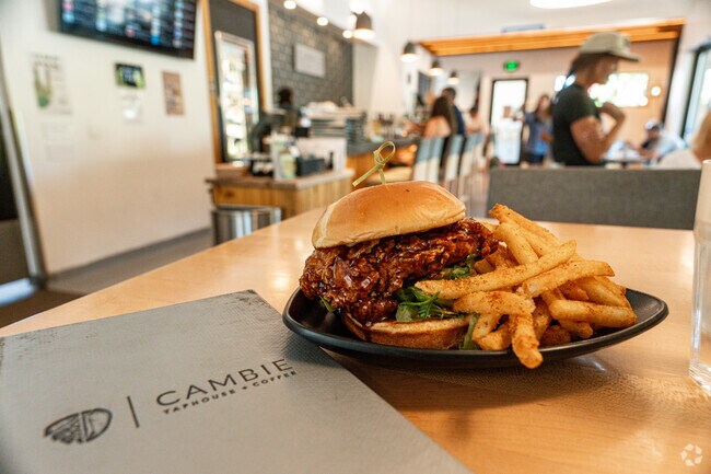 Unwind and enjoy good eats at Cambie Taphouse + Coffee in the Lewis and Clark neighborhood.