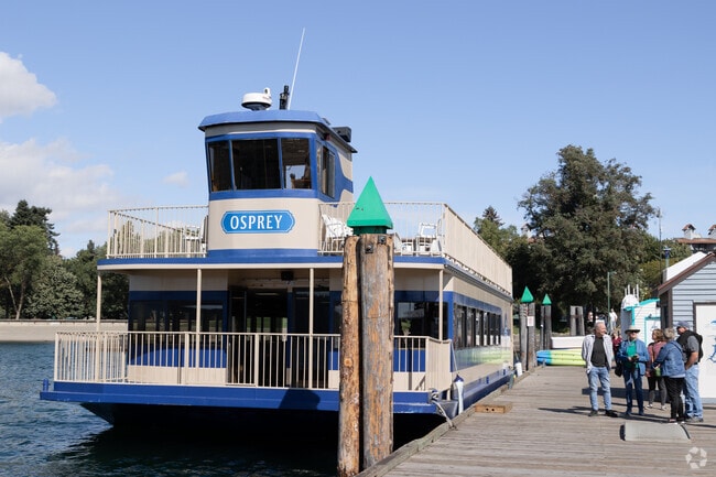 Tourists disembark from water tours at the Coeur d'Alene Boardwalk.
