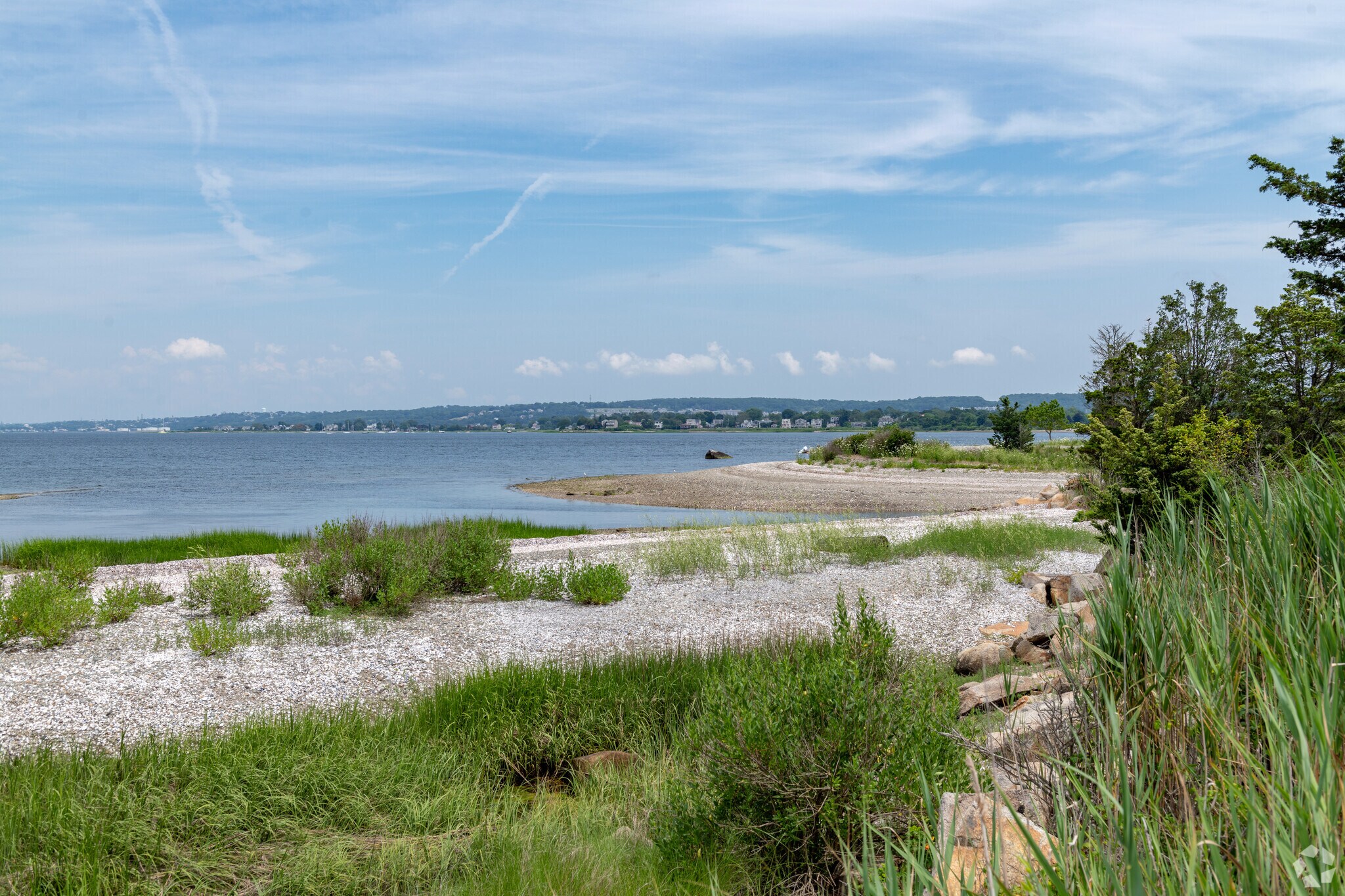 Pebble beaches line most of the coast of the Bristol Ferry neighborhood.