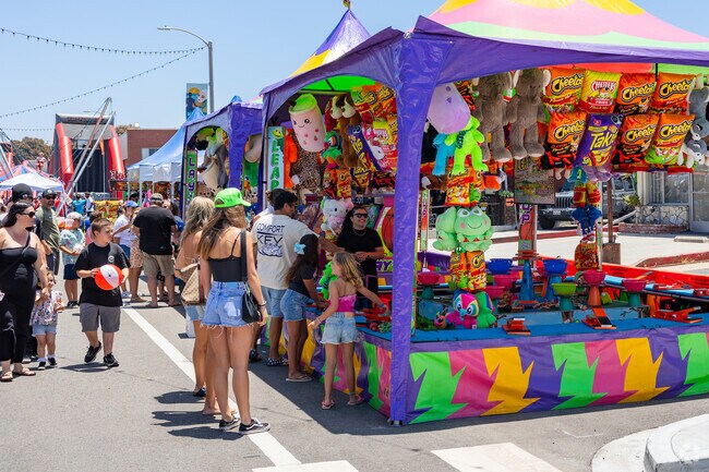 Have fun playing carnival games at Riviera Village Summer Festival.