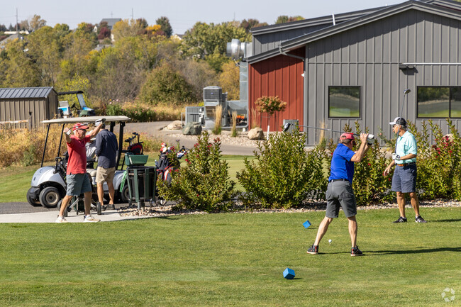 Hit the lynx with your 4some at Northern Hills Golf Course, near  the Badger Hills neighborhood.