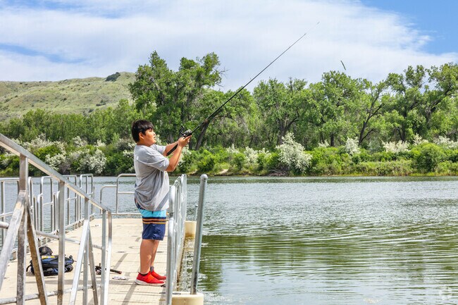 Enjoy fishing on the dock at Riverfront Park near Highlands.