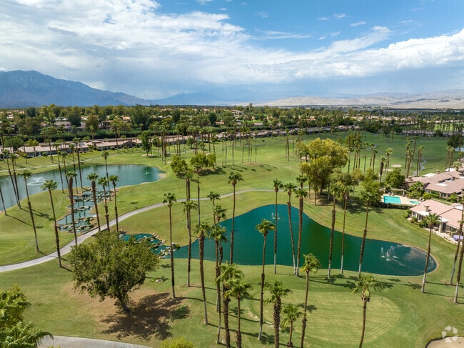 Lakeside serenity amidst Palm Valley's greens.