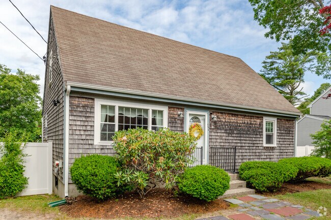 This shingled cape is a well maintained treasure in the White Island Shores neighborhood.