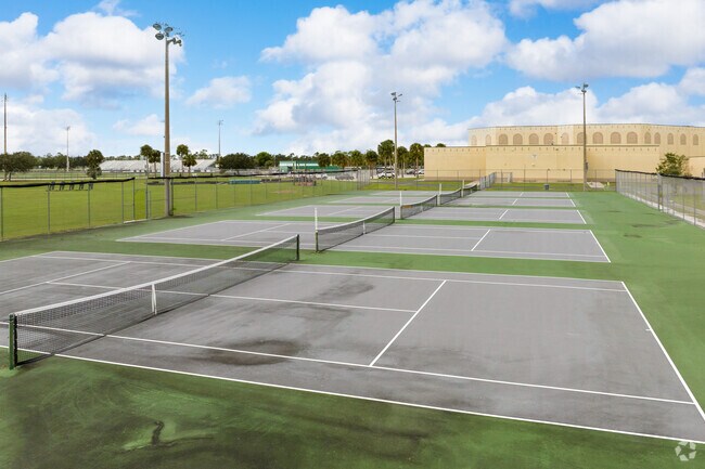 There are 4 tennis courts at Palmetto Ridge High School in East Naples