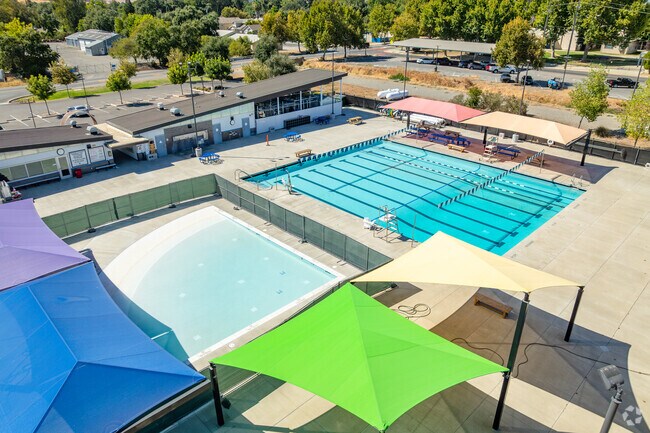 A seasonal pool anchors community life at Tuli Memorial Park.