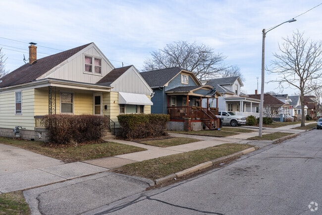 Charming bungalows and cottages share a tidy block in the 14th Ward.