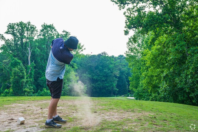 Play a round of golf at the Alfred Tup Holmes course inside Adams Park in Campbellton Road.
