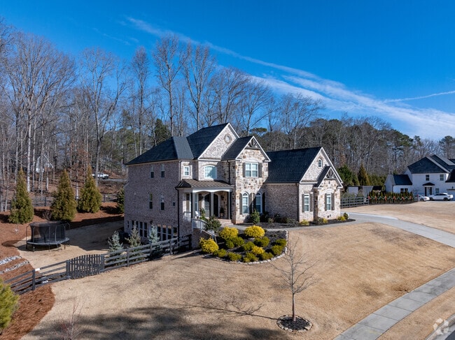 A larger contemporary home sitting on a larger lot in the Martin's Landing area.