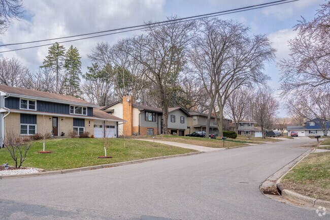 The homes in the Meadow Lake Park neighborhood have different styles with unique color appearances.