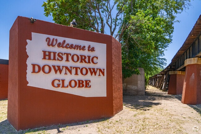 A welcoming sign marks the entrance to Historic Downtown Globe, home to local businesses, cafés, and cultural landmarks.