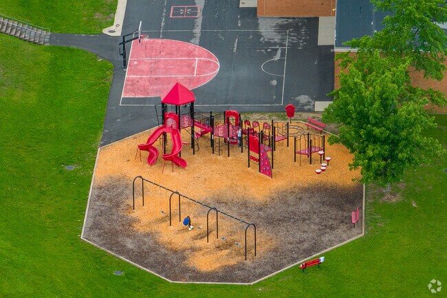 Bolivar Road Elementary has a playground a basketball court for students.