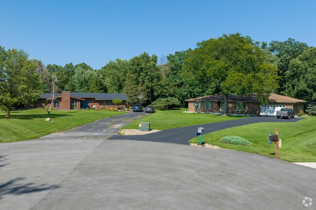 Two ranch homes sit at the end of a cul-de-sac in Deep Run, Merrillville, Indiana.