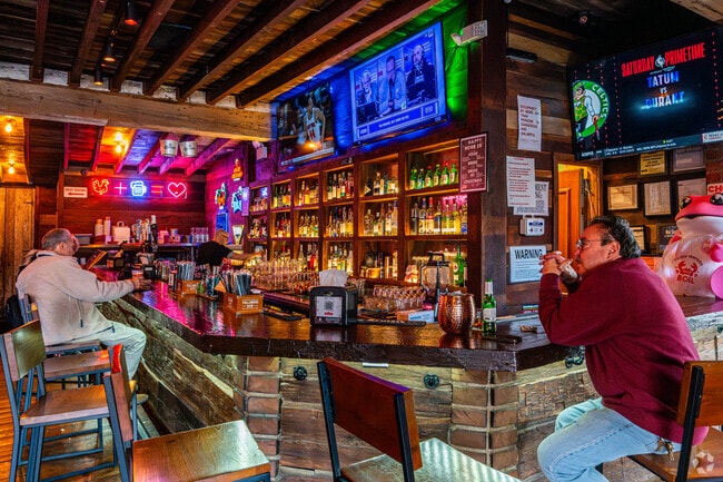 The bar at Mad For Chicken is a great place for hangouts n Bayside.