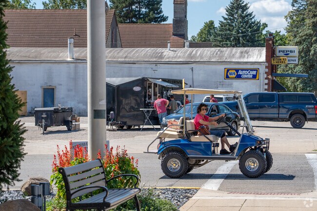 Golf carts are a common sight in downtown Hicksville during community events.