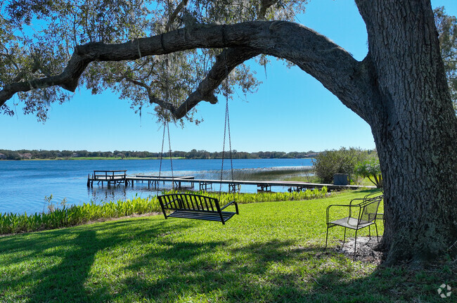 Enjoy a scenic view at Lake Bessie Park in Windermere.