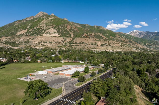 Holladay Boulevard passes in front of Cottonwood Elementary School located at the base of the Wa
