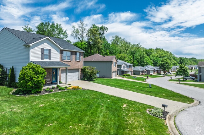 New traditional homes in Melody Hill sit along winding streets.