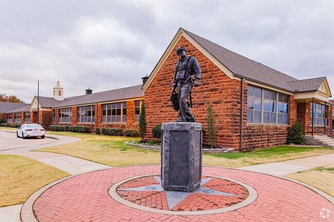 Russell Dougherty Elementary School had a memorial statue in front of the main building.