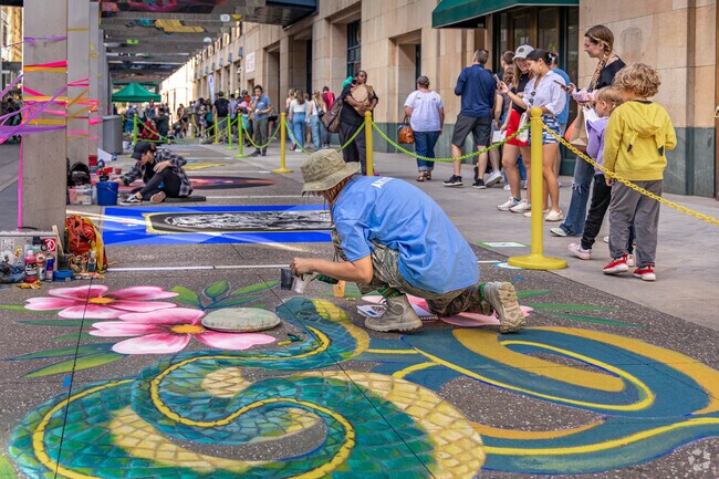 Attendees stolled Nicollet Mall watching the chalk art come to life at the Street Art Festival.